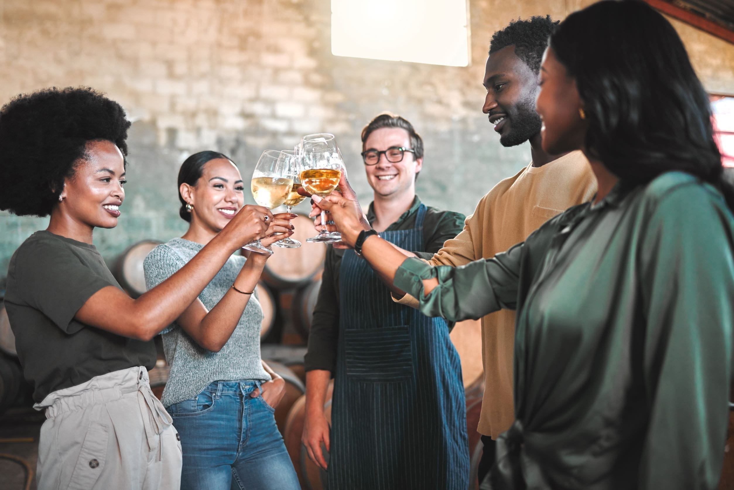 A group experiencing the pleasures of wine tasting.
